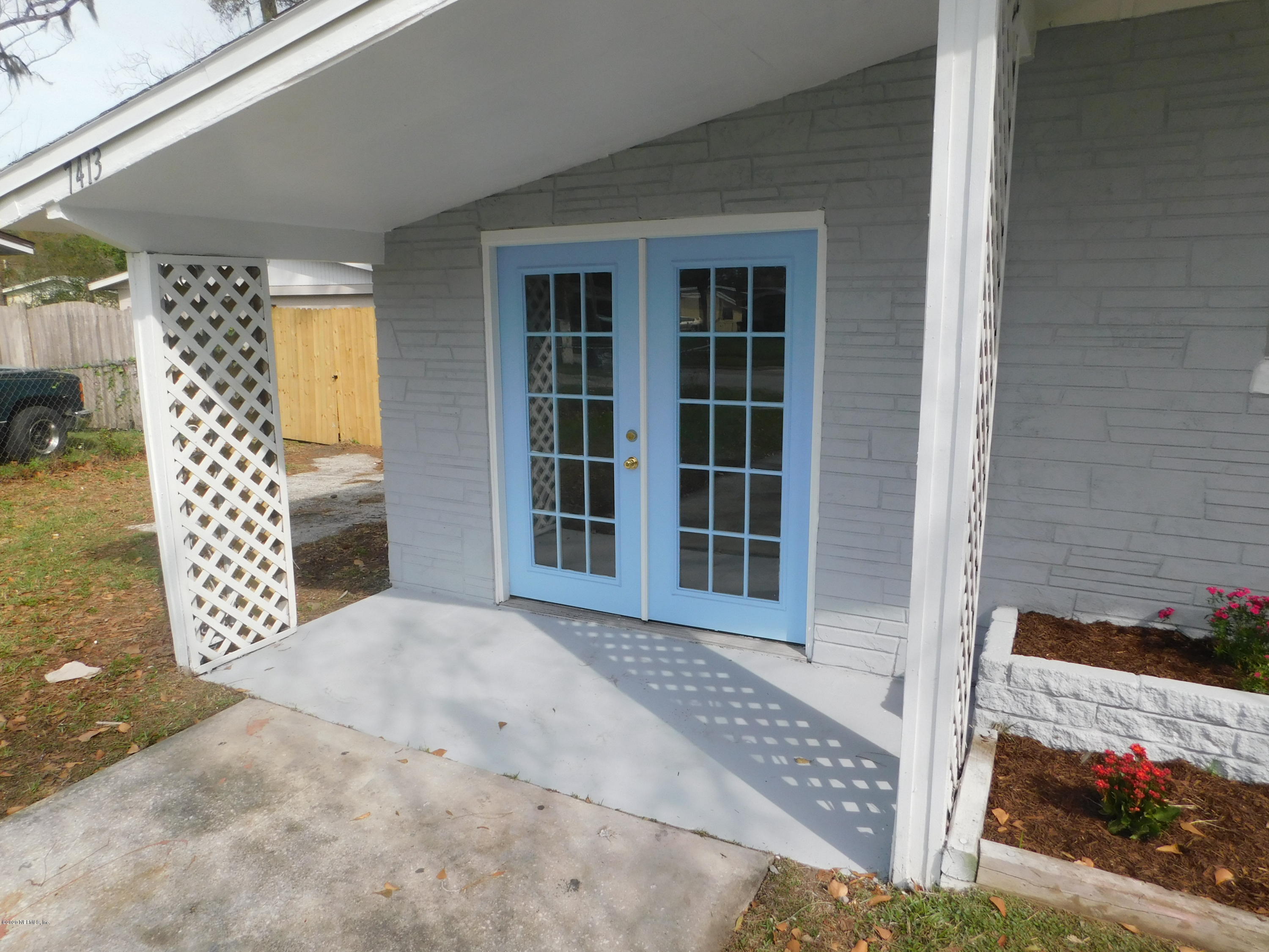 7413 Proxima Road Jacksonville, FL 32210 - Photo 19 of 24 a view of front door of house