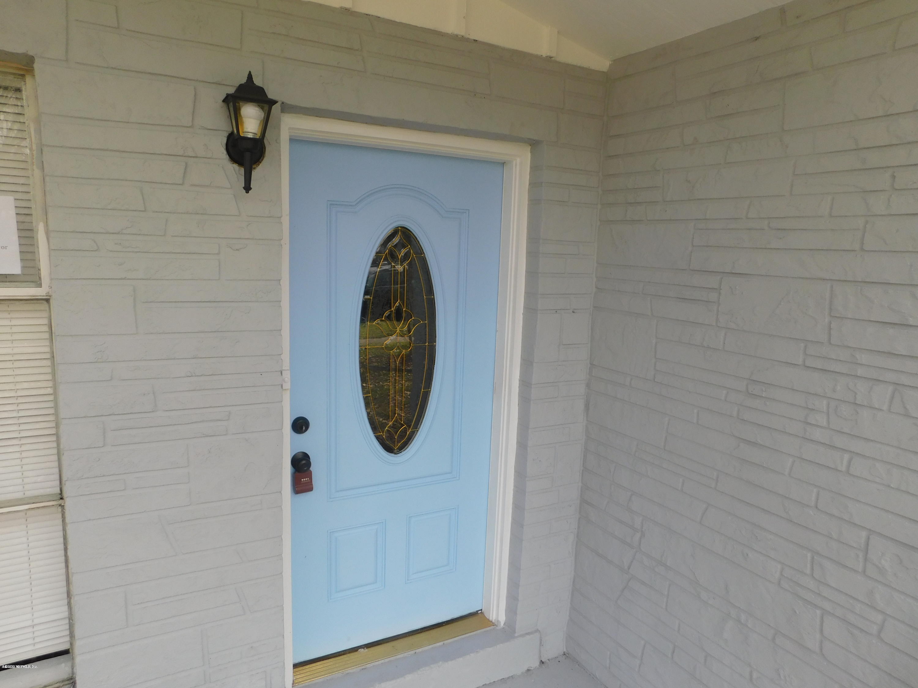 7413 Proxima Road Jacksonville, FL 32210 - Photo 2 of 24 a close view of a fireplace in a bathroom