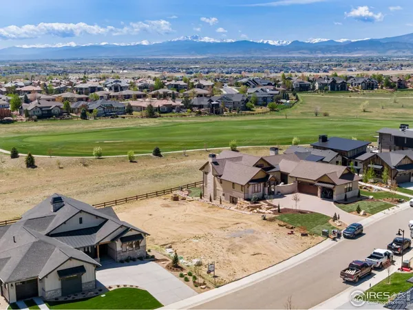 an aerial view of a house with outdoor space