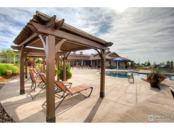 a view of a swimming pool with a patio