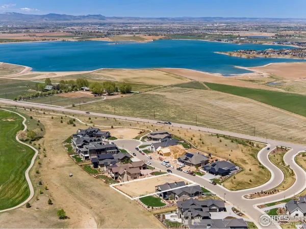 a view of an ocean and a mountain