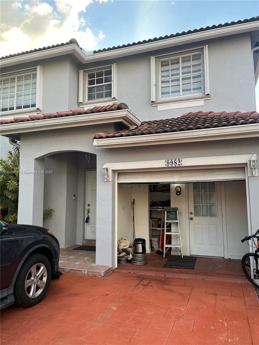 9982 Southwest 162nd Court Miami, FL 33196 - Photo 94 of 97 a blue house with outdoor space