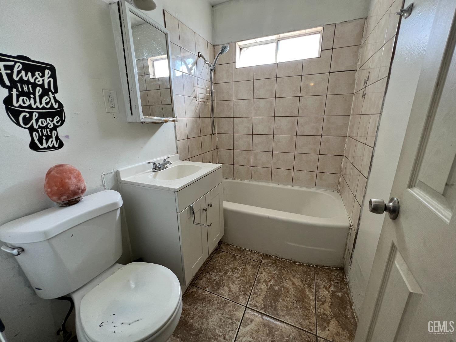 Undisclosed Address Bakersfield, CA 93306 - Photo 15 of 33 a bathroom with a sink toilet and shower