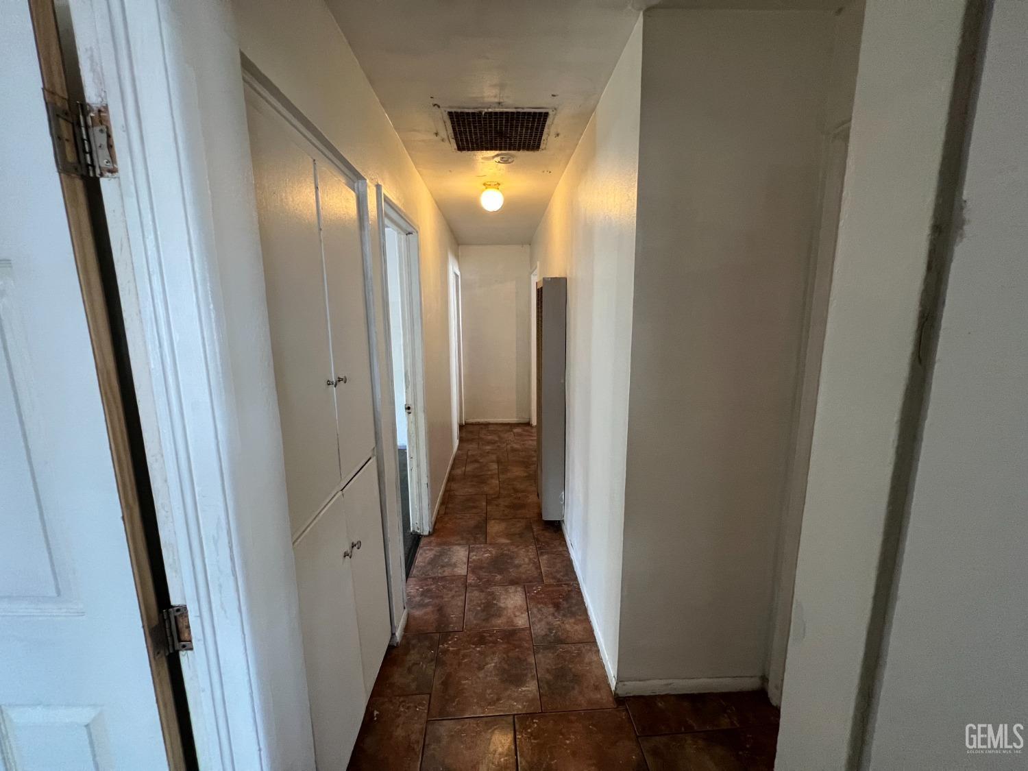 Undisclosed Address Bakersfield, CA 93306 - Photo 16 of 33 a view of a hallway with a elevator