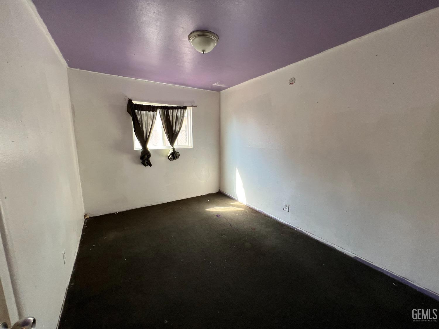 Undisclosed Address Bakersfield, CA 93306 - Photo 18 of 33 an empty room with a window