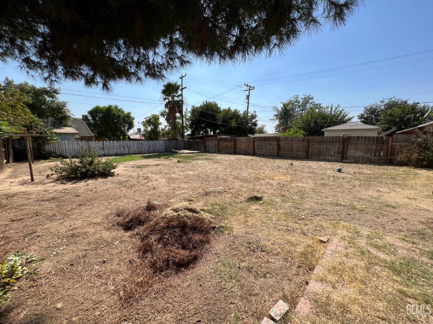 Undisclosed Address Bakersfield, CA 93306 - Photo 27 of 33 a swimming pool with an outdoor space and seating area