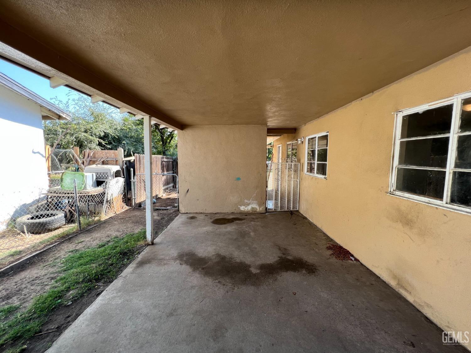 Undisclosed Address Bakersfield, CA 93306 - Photo 29 of 33 a backyard of a house with table and chairs