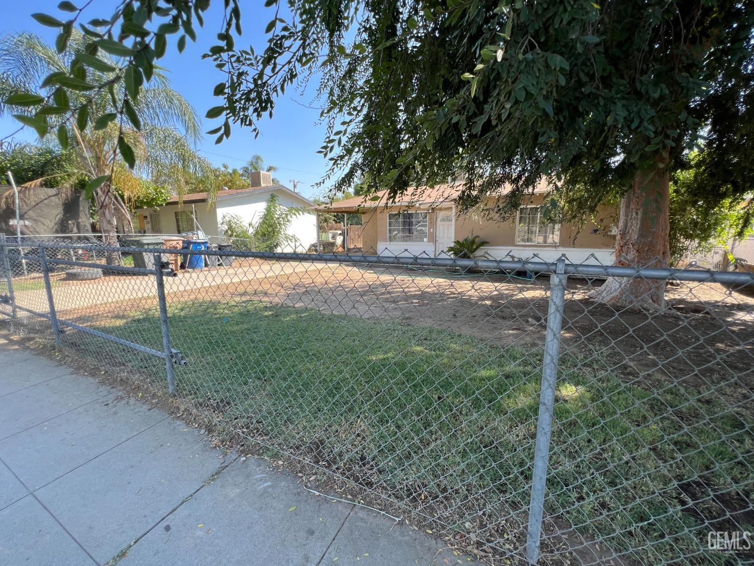 Undisclosed Address Bakersfield, CA 93306 - Photo 4 of 33 a view of road and trees