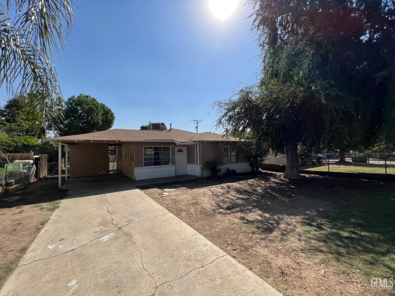 Undisclosed Address Bakersfield, CA 93306 - Photo 6 of 33 a view of a house with a yard