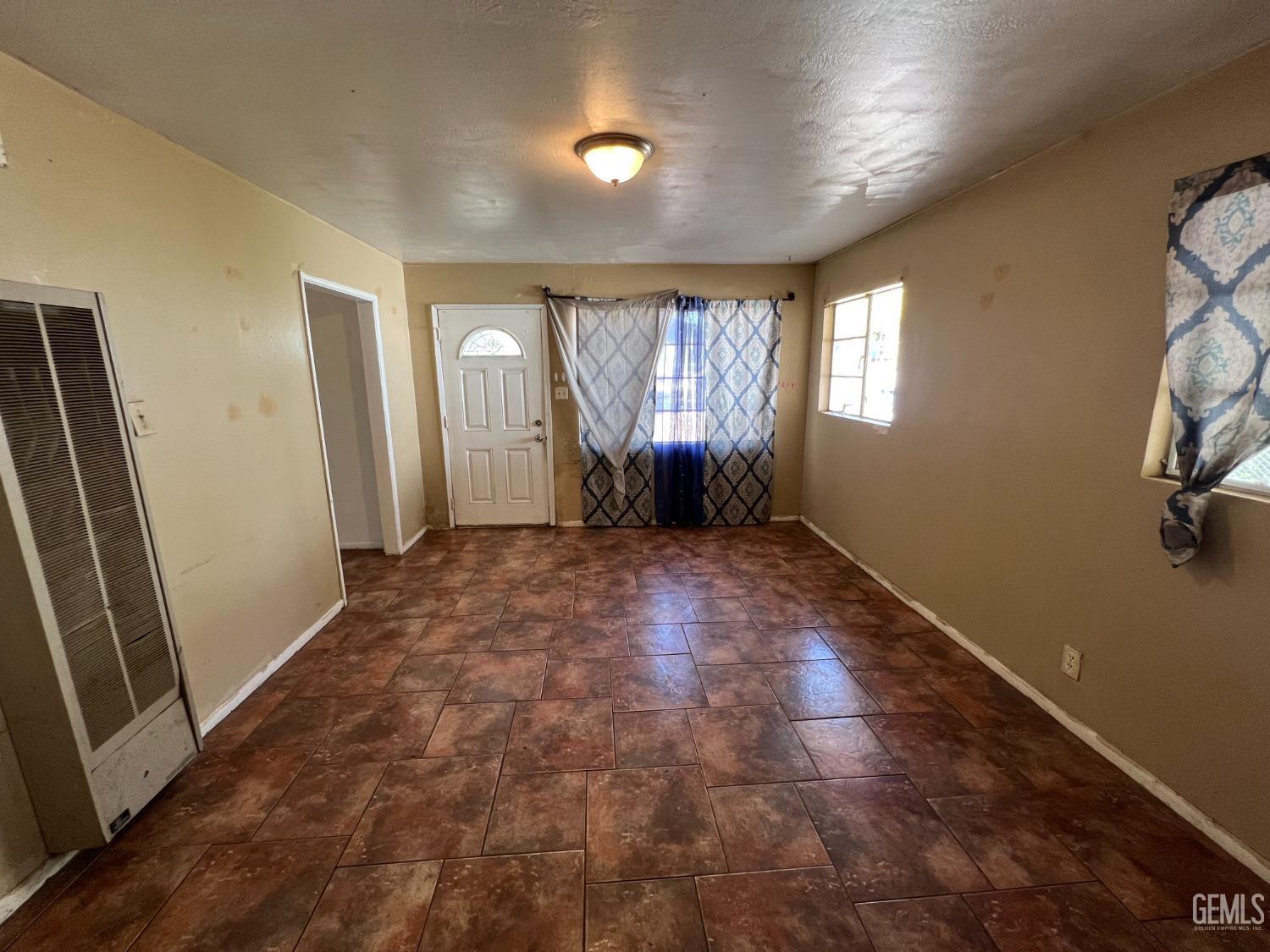 Undisclosed Address Bakersfield, CA 93306 - Photo 9 of 33 a view of an empty room and window
