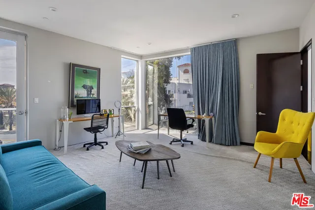 a bathroom with a toilet sink shower and mirror