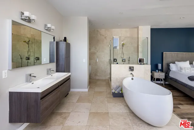 a bathroom with a bathtub and a sink