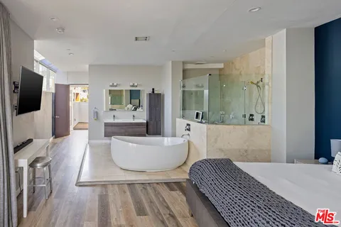 a view of a kitchen with furniture and washer