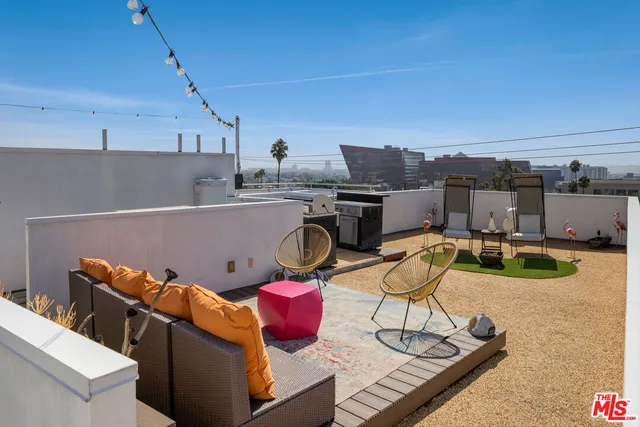 a kitchen with table and chairs