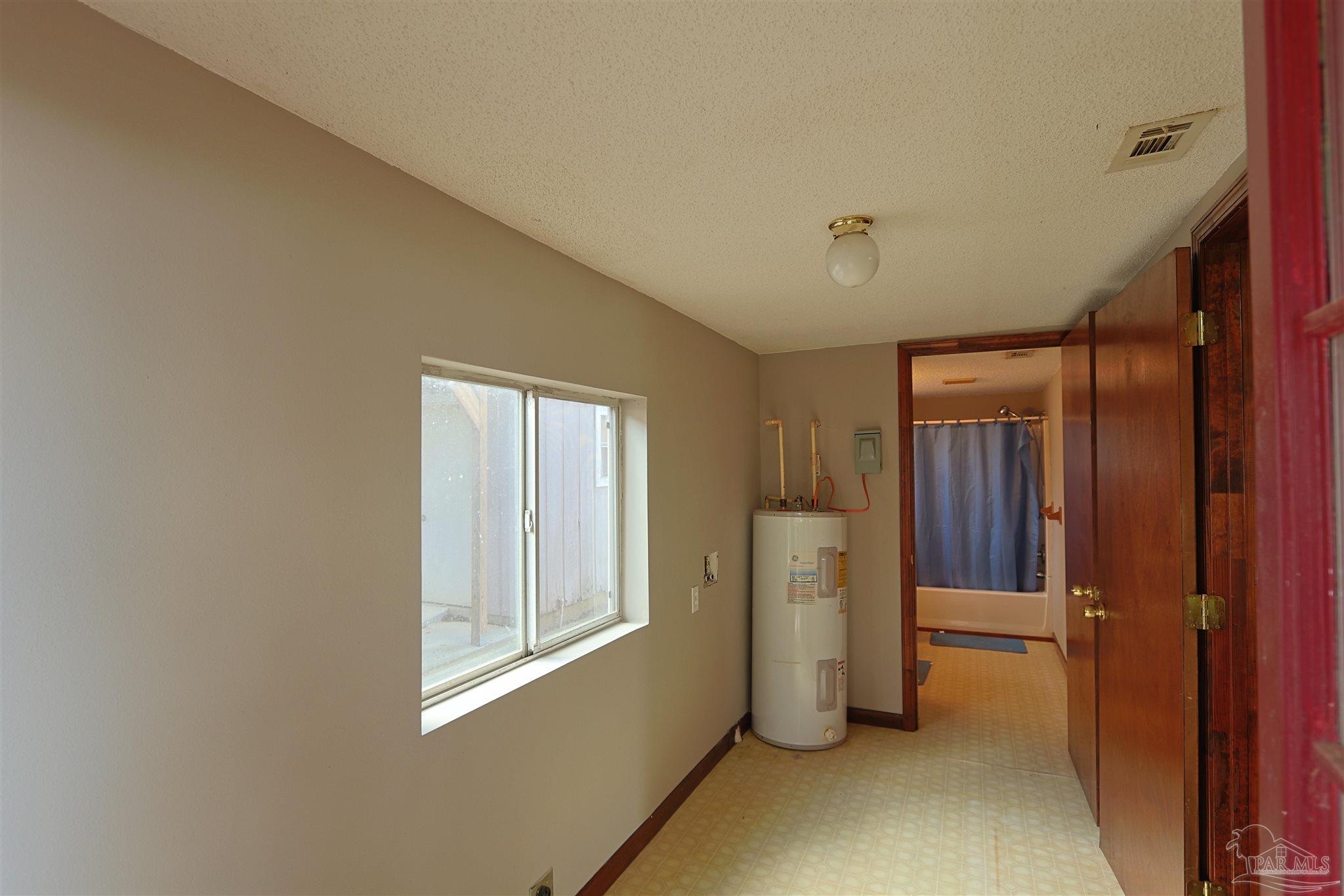 6941 Camp Henderson Road Jay, FL 32565 - Photo 12 of 17 a view of an empty room