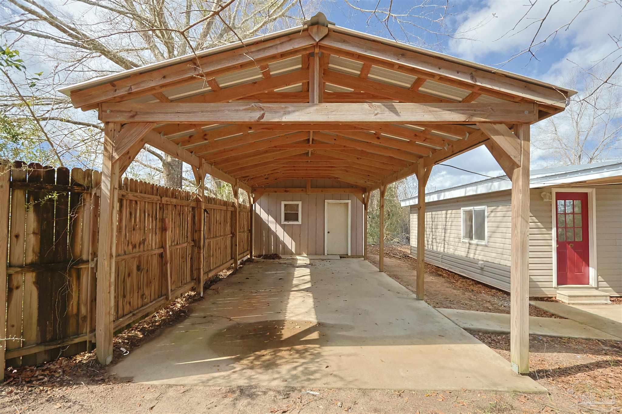 6941 Camp Henderson Road Jay, FL 32565 - Photo 14 of 17 a view of a roof deck