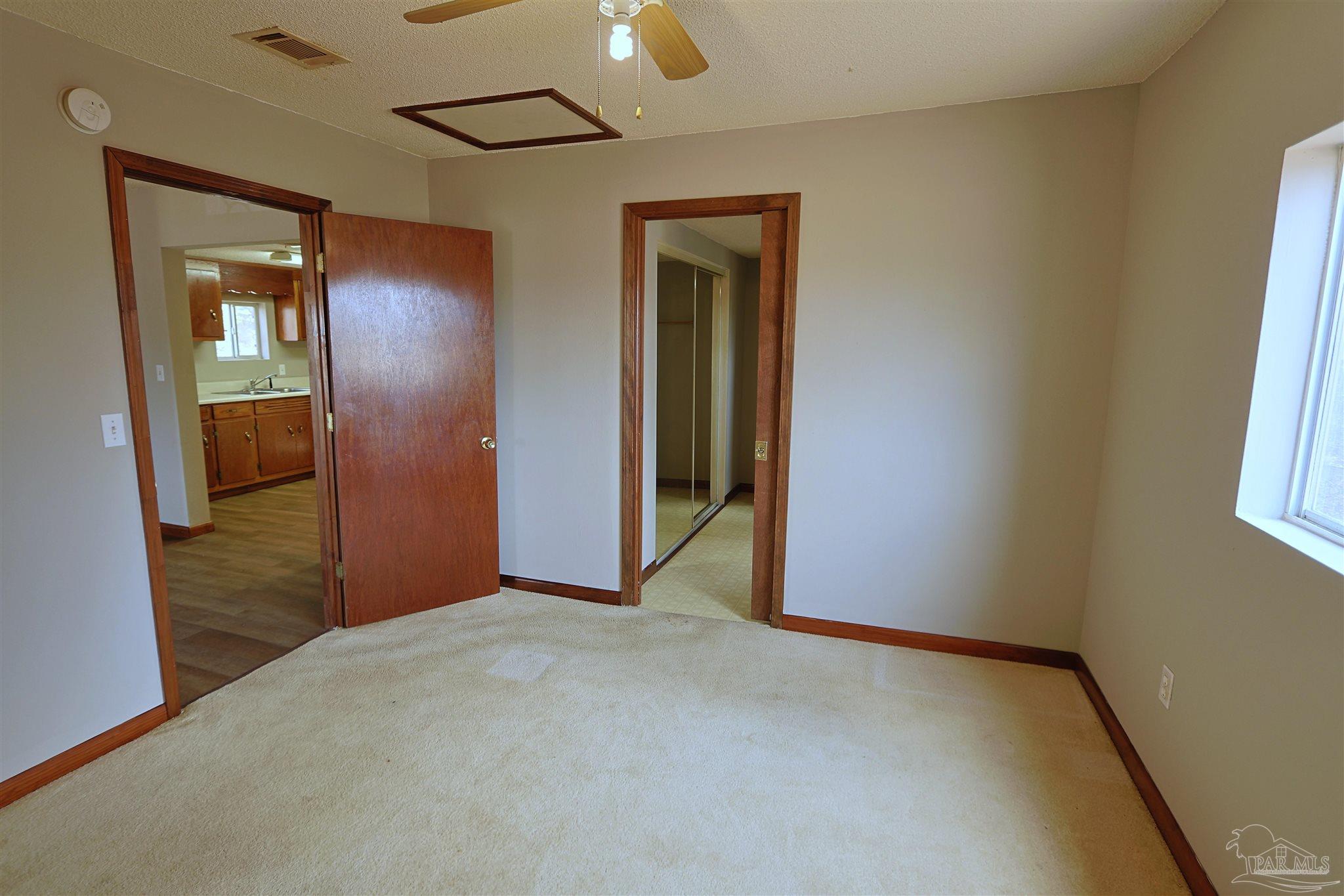 6941 Camp Henderson Road Jay, FL 32565 - Photo 7 of 17 a view of an empty room