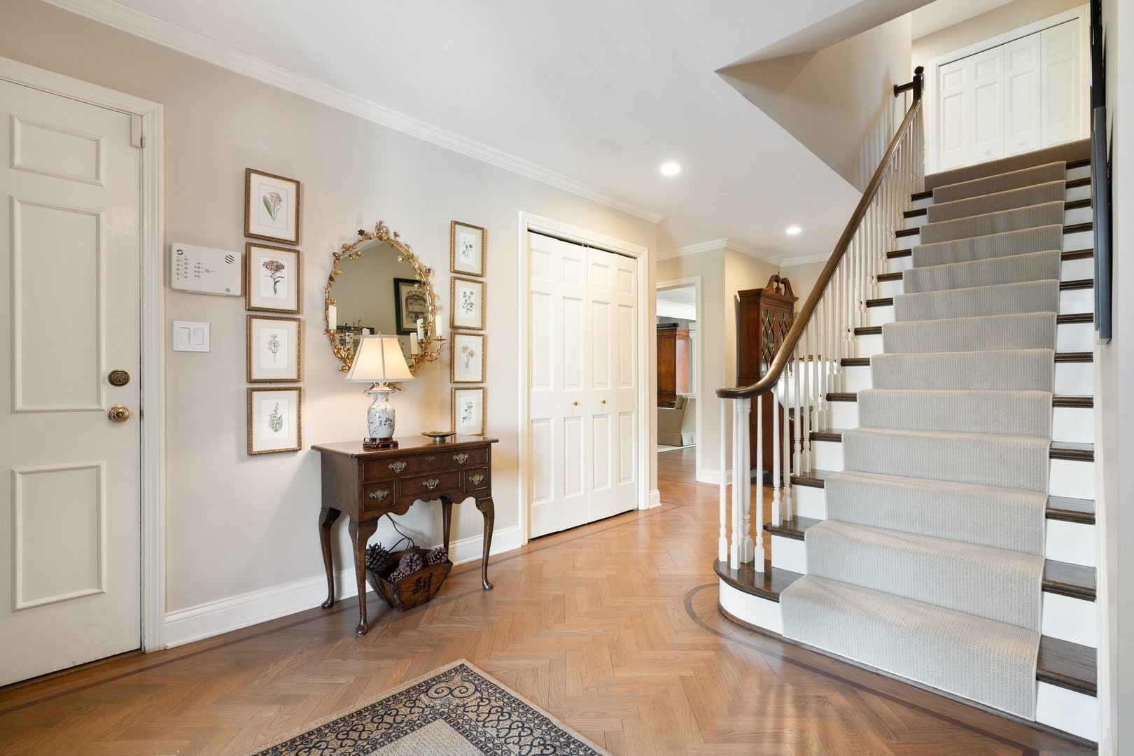 280 Sylvan Road Glencoe, IL 60022 - Photo 2 of 45 a view of an entryway with wooden floor and windows
