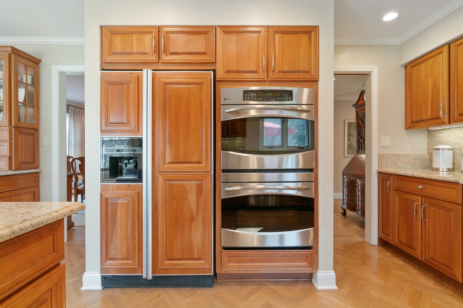 280 Sylvan Road Glencoe, IL 60022 - Photo 11 of 45 a kitchen with stainless steel appliances granite countertop a refrigerator and cabinets