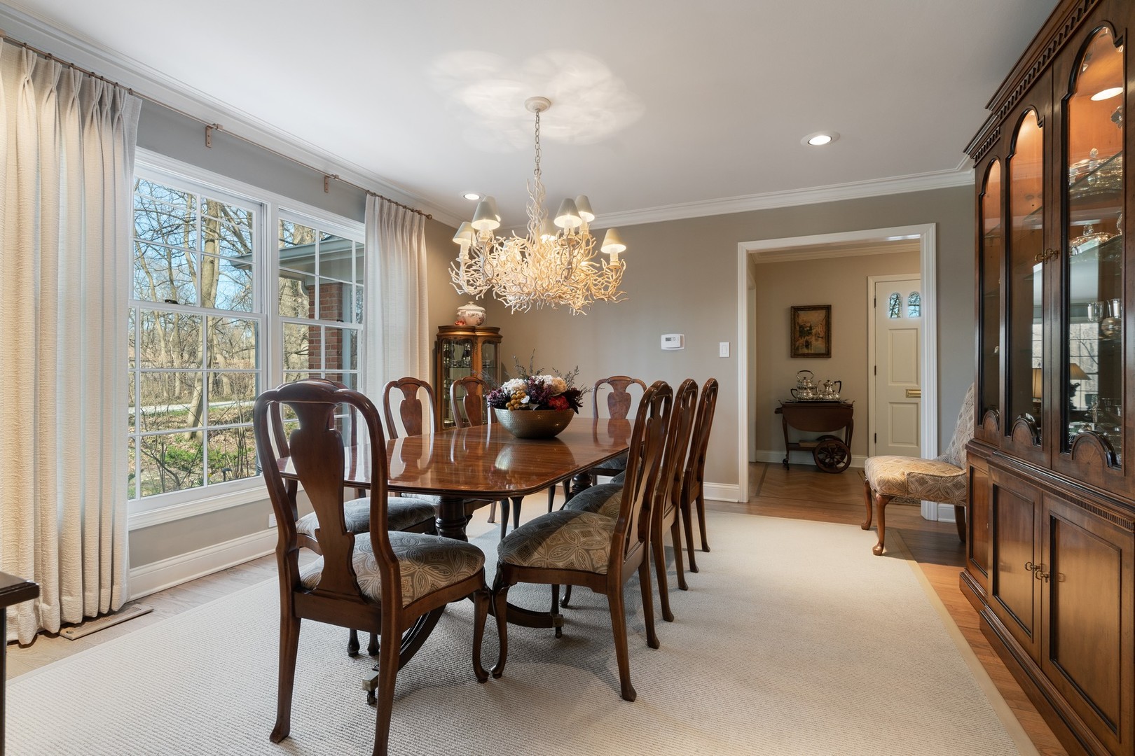 280 Sylvan Road Glencoe, IL 60022 - Photo 12 of 45 a dining room with furniture a chandelier and window