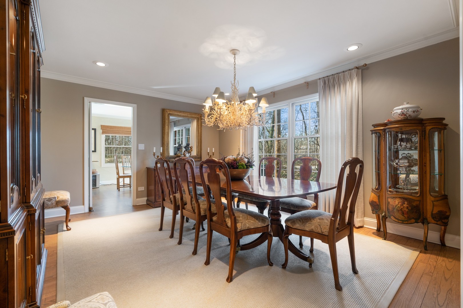 280 Sylvan Road Glencoe, IL 60022 - Photo 13 of 45 a view of a dining room with furniture window and wooden floor