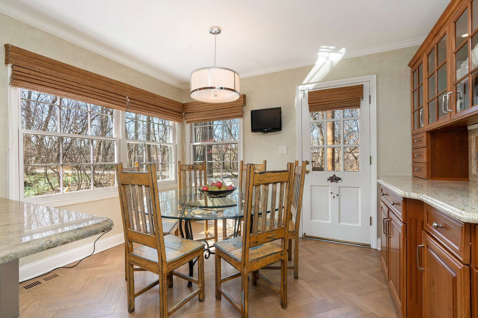 280 Sylvan Road Glencoe, IL 60022 - Photo 14 of 45 a view of a dining room with furniture window and wooden floor