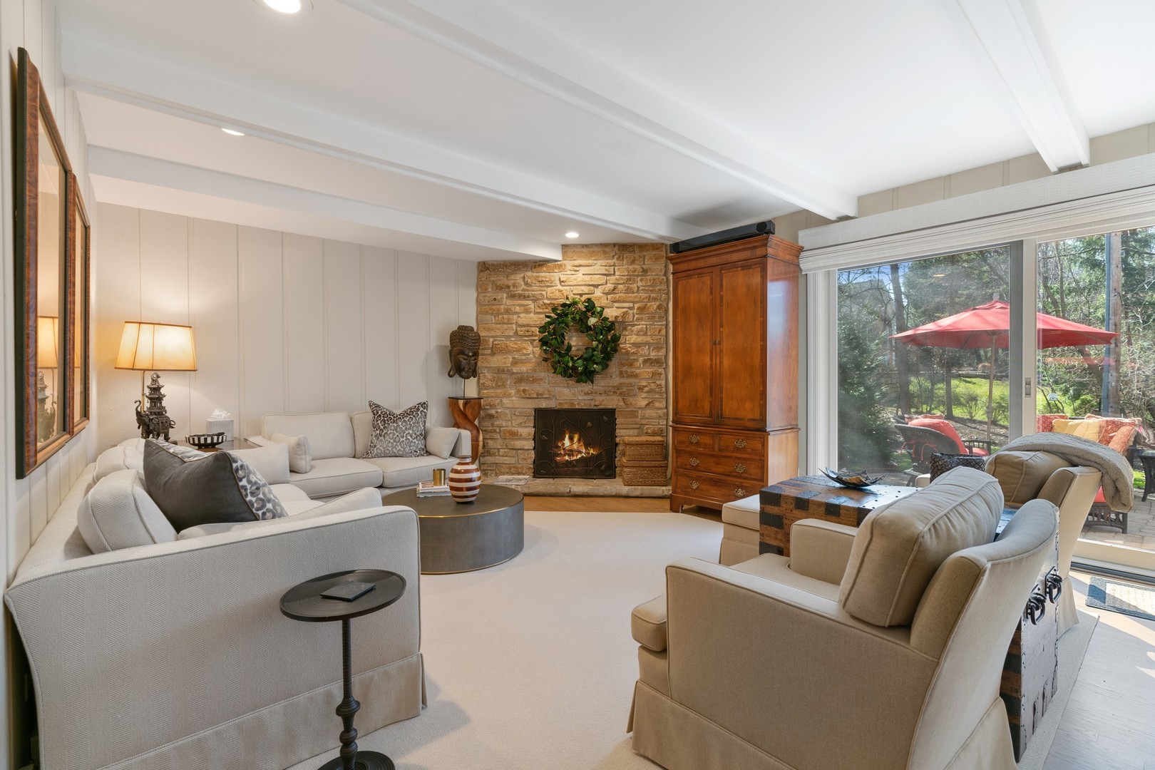 280 Sylvan Road Glencoe, IL 60022 - Photo 15 of 45 a living room with furniture large window and a fireplace