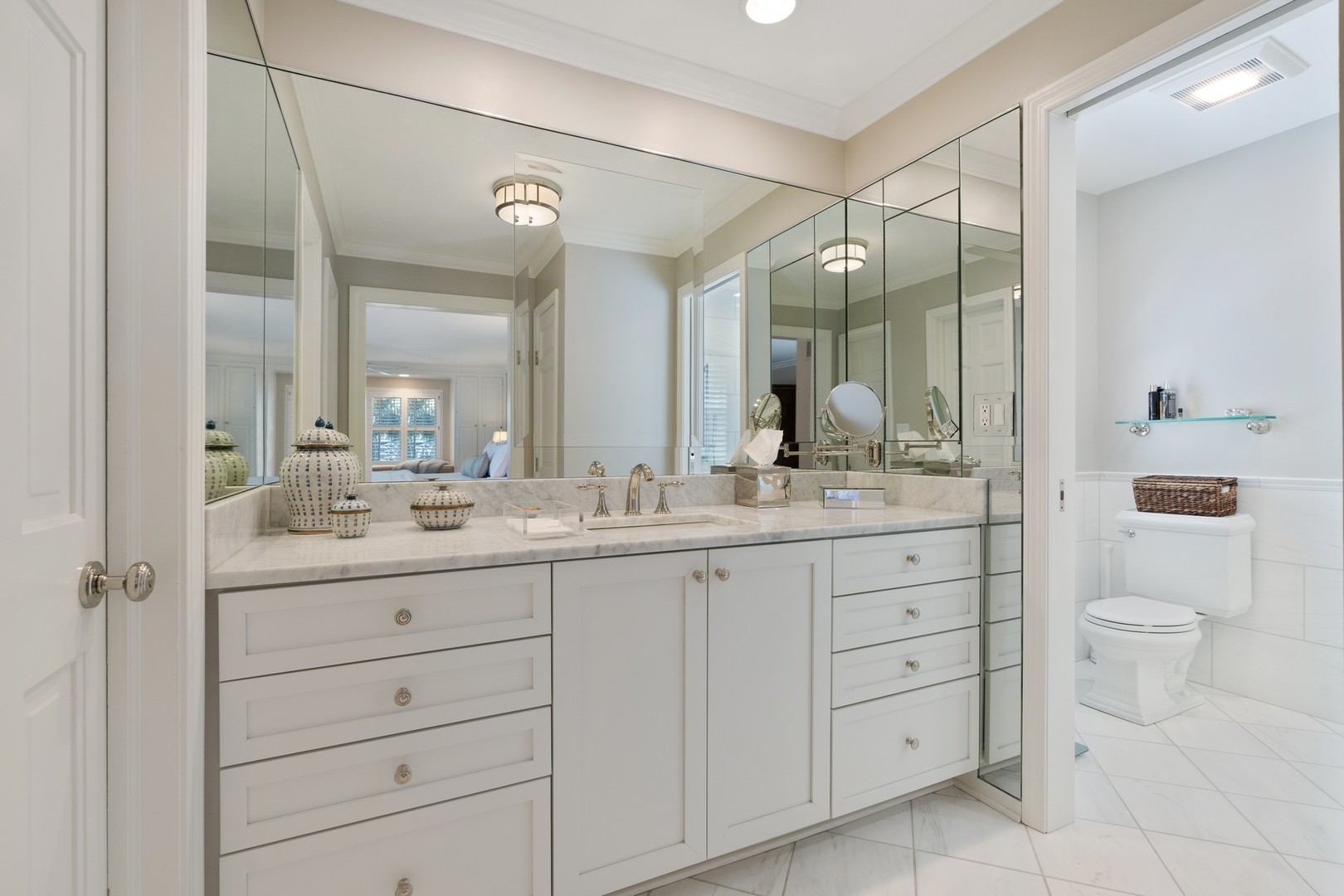 280 Sylvan Road Glencoe, IL 60022 - Photo 21 of 45 a bathroom with a granite countertop sink mirror and toilet