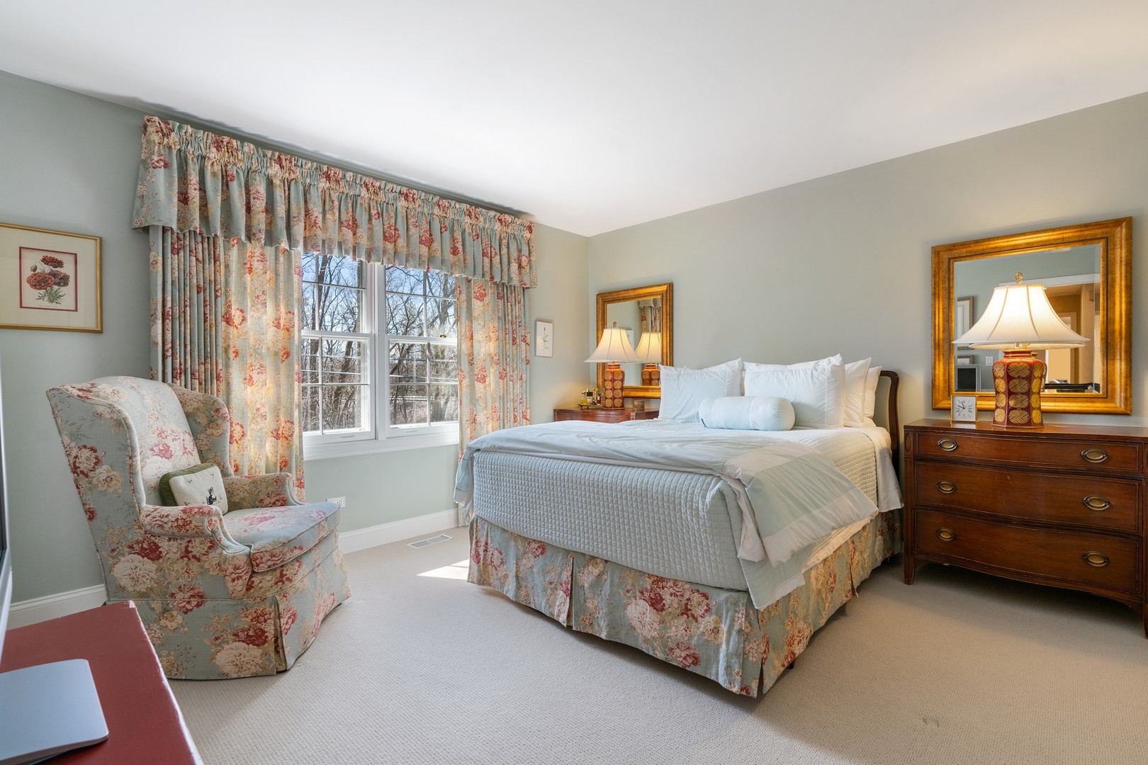 280 Sylvan Road Glencoe, IL 60022 - Photo 24 of 45 a bedroom with a bed and a couch next to a window