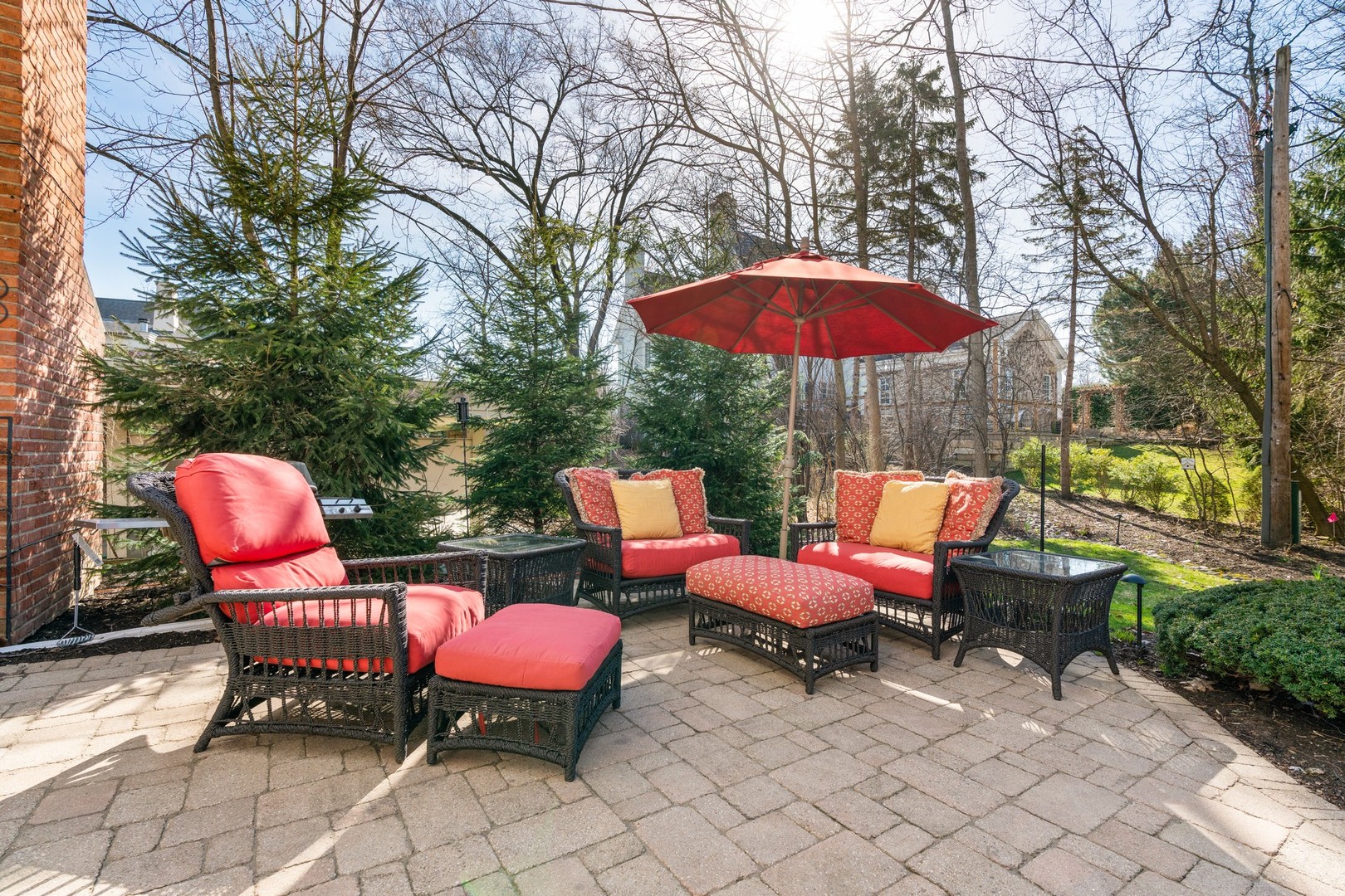 280 Sylvan Road Glencoe, IL 60022 - Photo 37 of 45 an outdoor sitting area with red umbrella