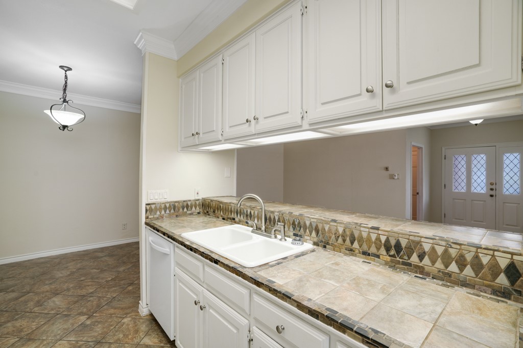 2208 Indian Trail, Unit A Austin, TX 78703 - Photo 8 of 21 a bathroom with a sink and a mirror