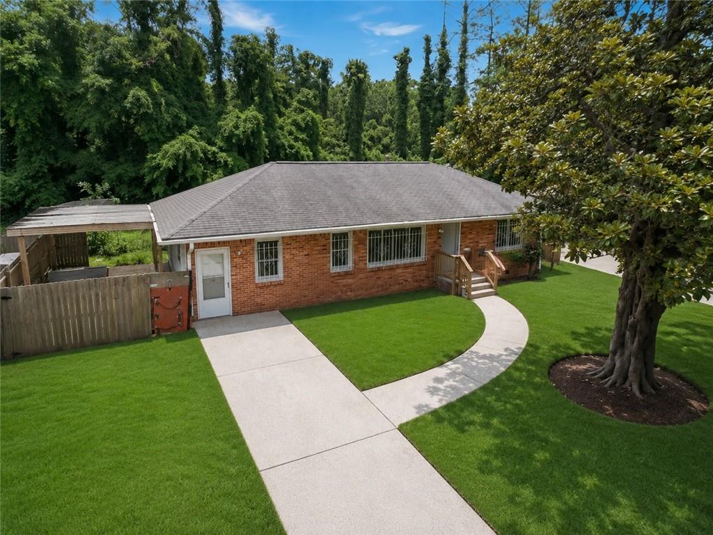 1189 Rock Cut Road Forest Park, GA 30297 - Photo 3 of 23 a view of a house with a sink and a yard