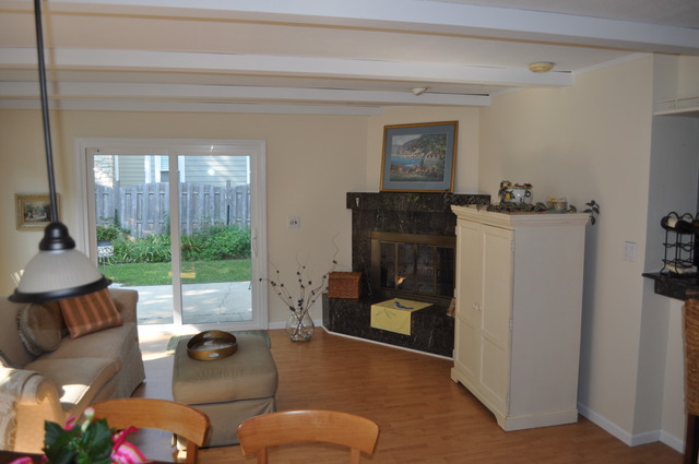 326 Wagner Road Northfield, IL 60093 - Photo 8 of 14 a living room with furniture and a floor to ceiling window