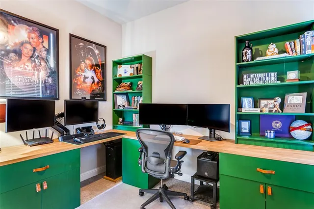 a view of a workspace with furniture and toys