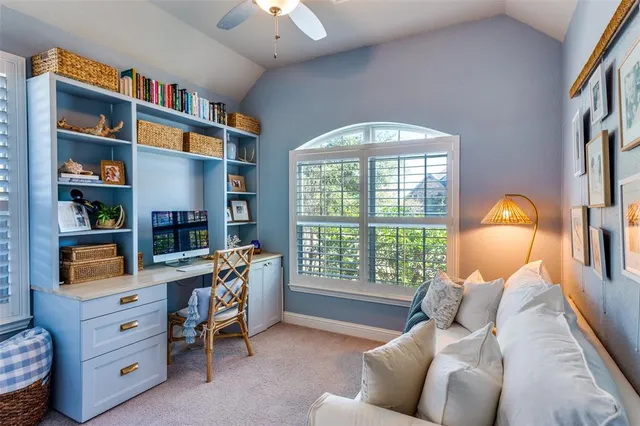 a bed room with a bed and a bookshelf