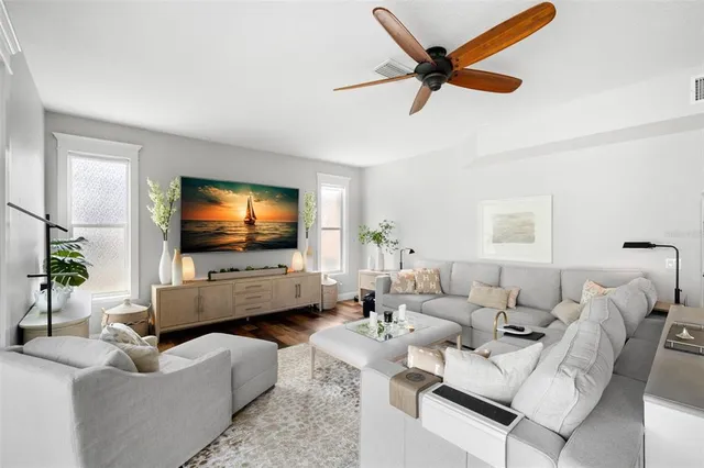 a bathroom with a granite countertop sink a large mirror and shower