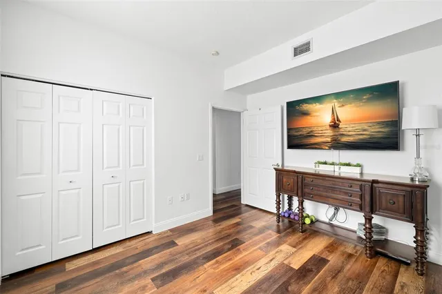 a view of a patio with couches and table and chairs