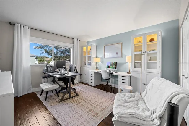 a view of parking garage with cars and other equipment