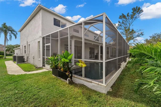 a view of swimming pool with an outdoor space and seating area