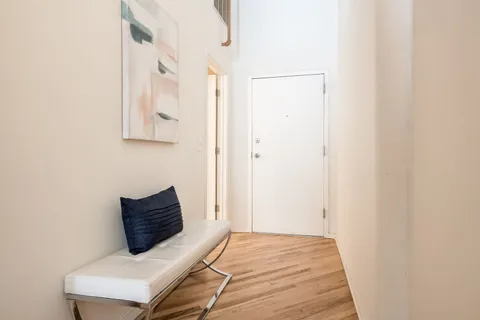 a room with a bed and a window
