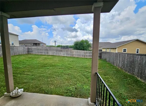 a view of a porch with a backyard
