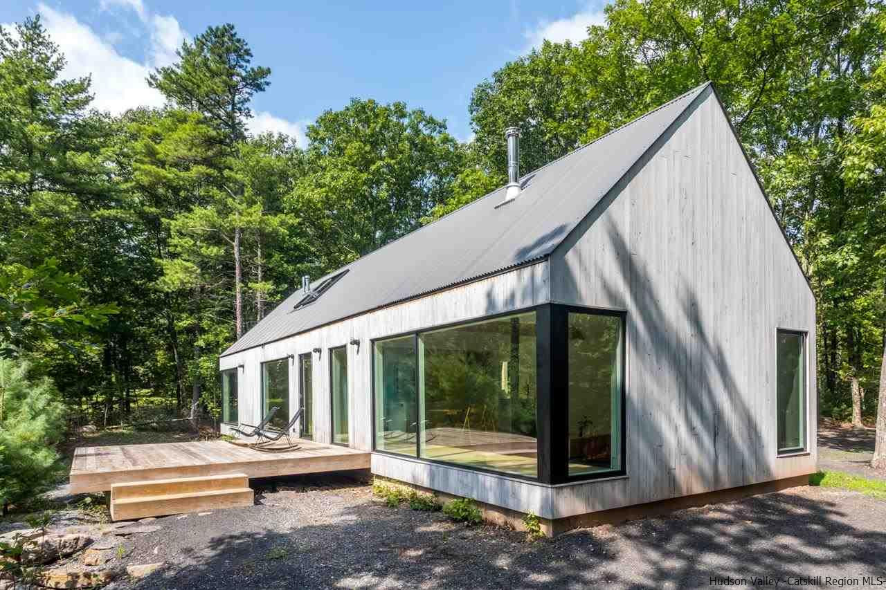 261 Blackhead Mountain Round Top, NY 12473 - Photo 2 of 34 a view of small house with yard and sitting area
