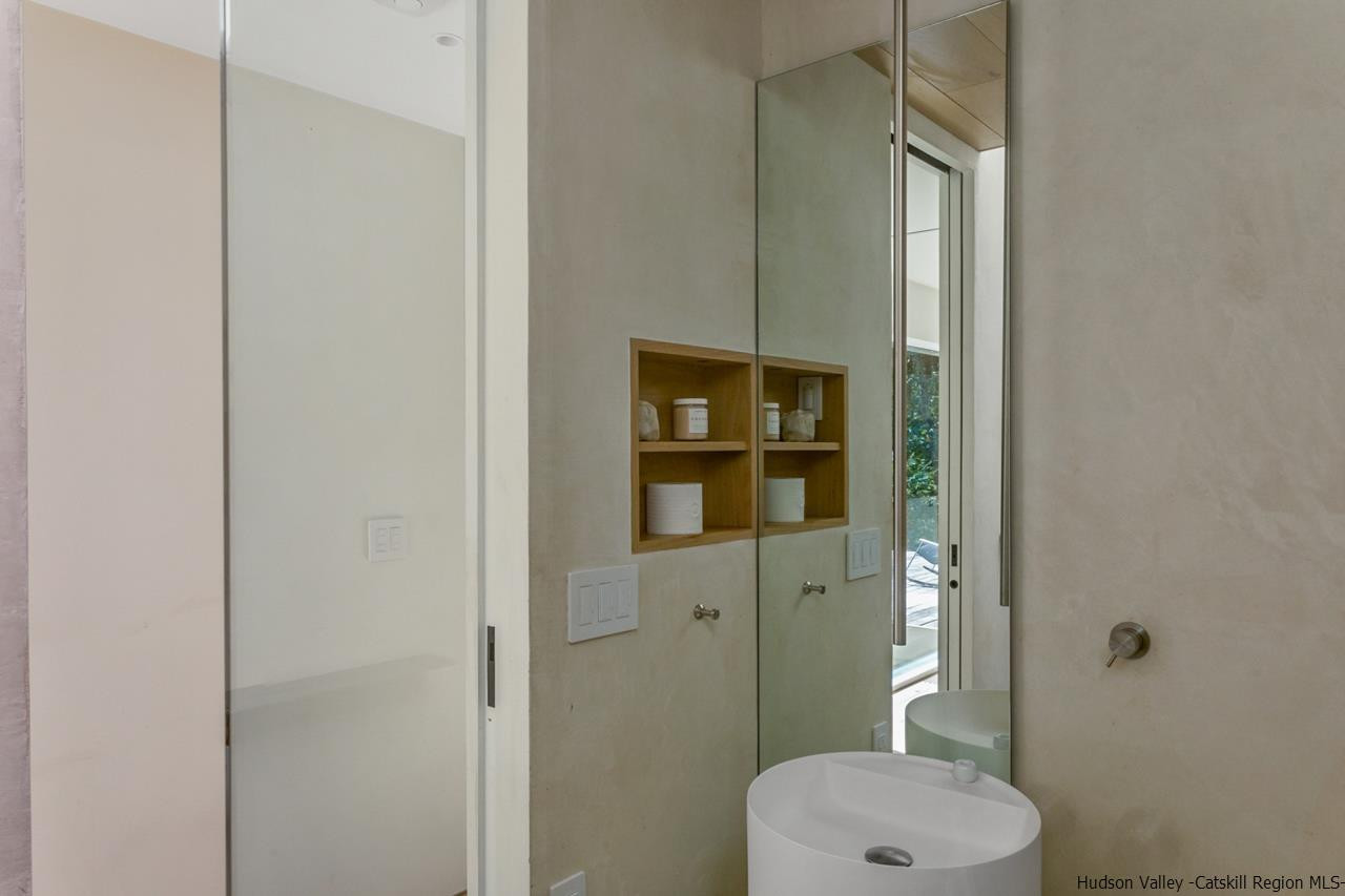 261 Blackhead Mountain Round Top, NY 12473 - Photo 21 of 34 a bathroom with a toilet and a shower
