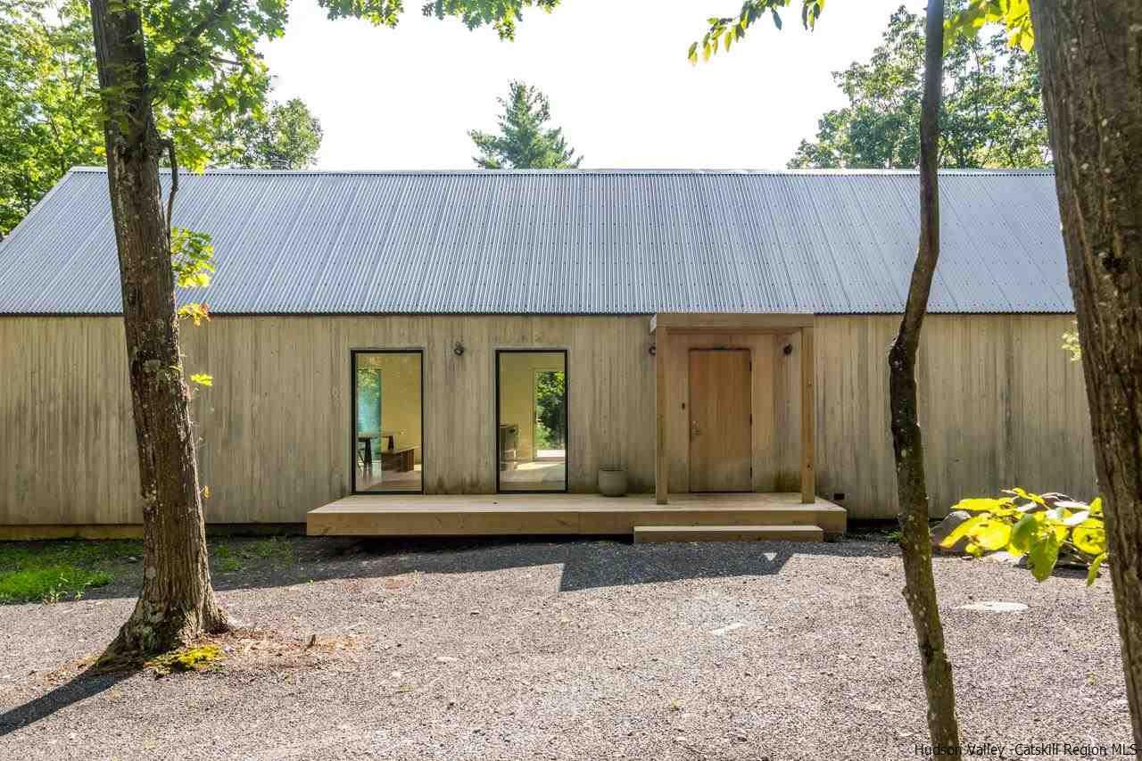 261 Blackhead Mountain Round Top, NY 12473 - Photo 33 of 34 a view of a house with backyard and sitting area