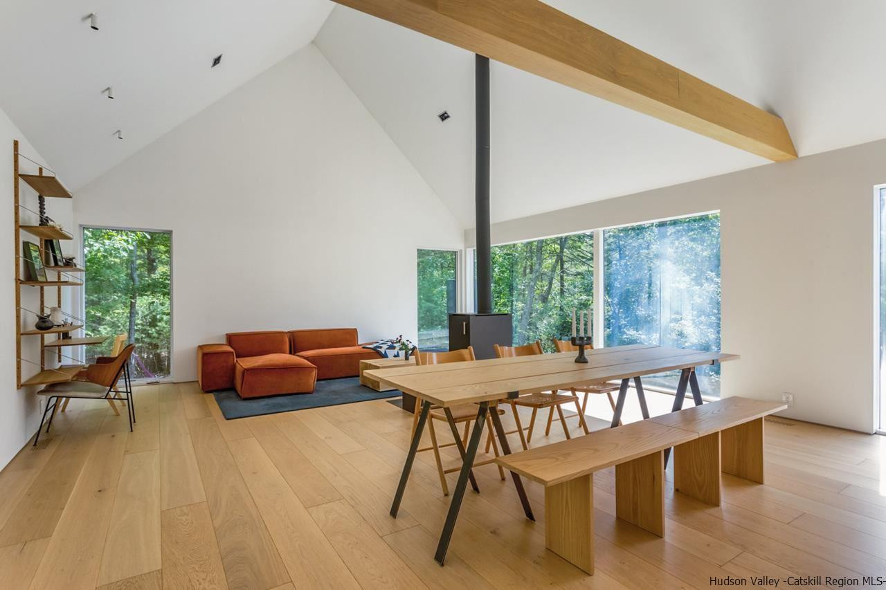 261 Blackhead Mountain Round Top, NY 12473 - Photo 4 of 34 a dining room with furniture window and wooden floor