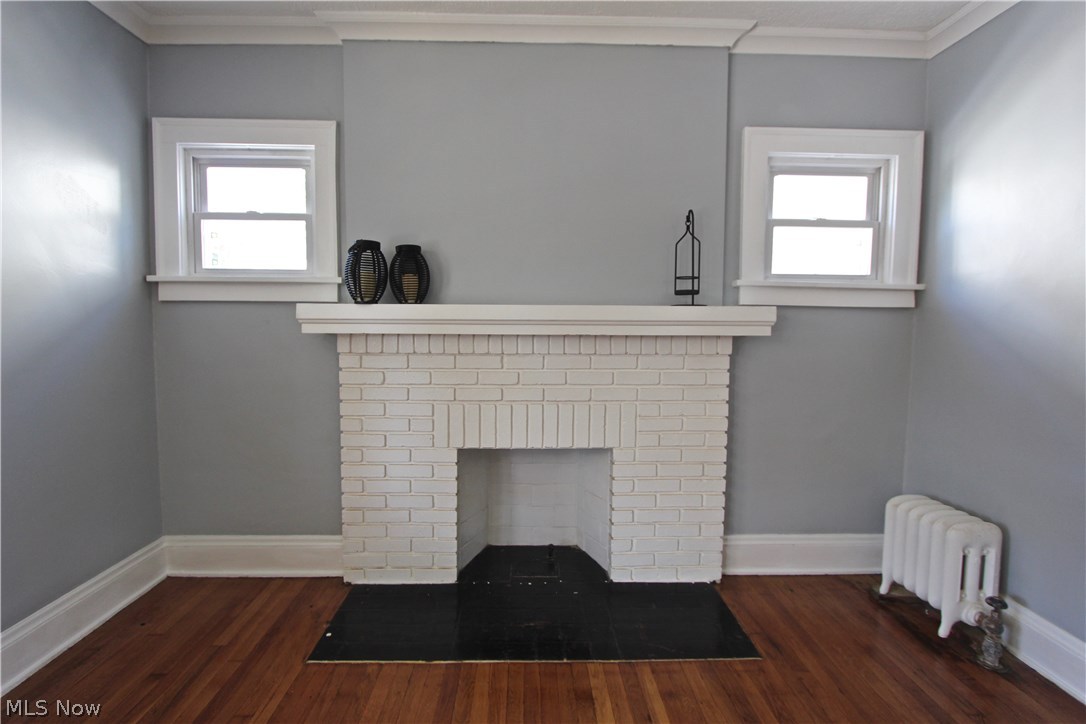 2111 Rossmoor Road Cleveland Heights, OH 44118 - Photo 3 of 29 Beautiful fireplace is the focal point of this stuffing living room
