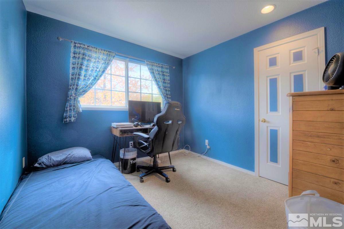 15135 Sylvester Road Reno, NV 89521 - Photo 14 of 34 a workspace with furniture and a window
