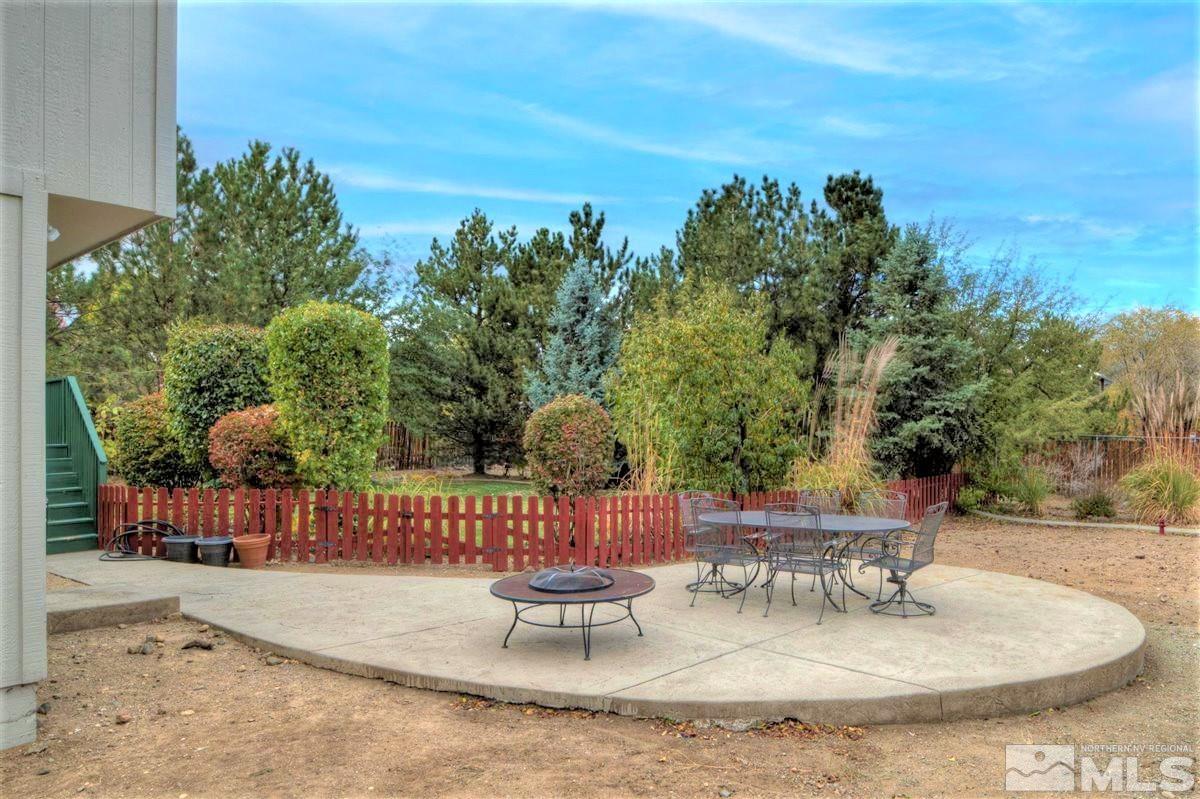 15135 Sylvester Road Reno, NV 89521 - Photo 22 of 34 a view of a backyard with sitting area