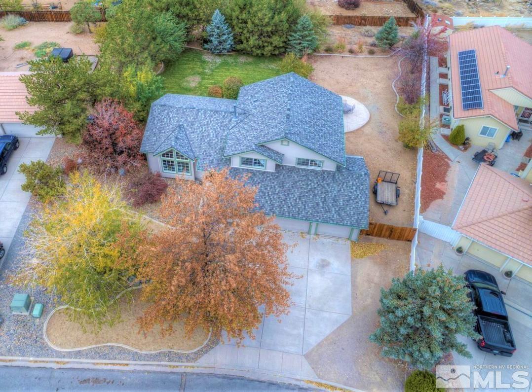 15135 Sylvester Road Reno, NV 89521 - Photo 32 of 34 an aerial view of a house with yard swimming pool and outdoor seating