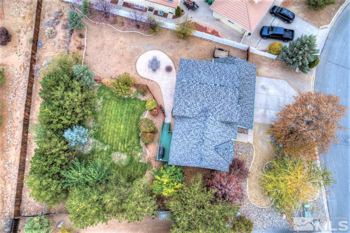 15135 Sylvester Road Reno, NV 89521 - Photo 33 of 34 an aerial view of a house with a yard and garden